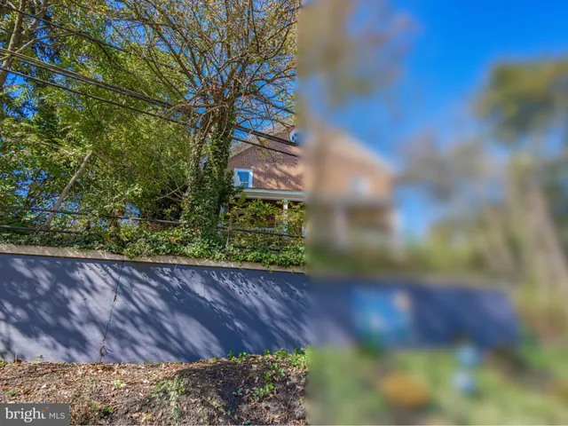 a view of a wooden fence