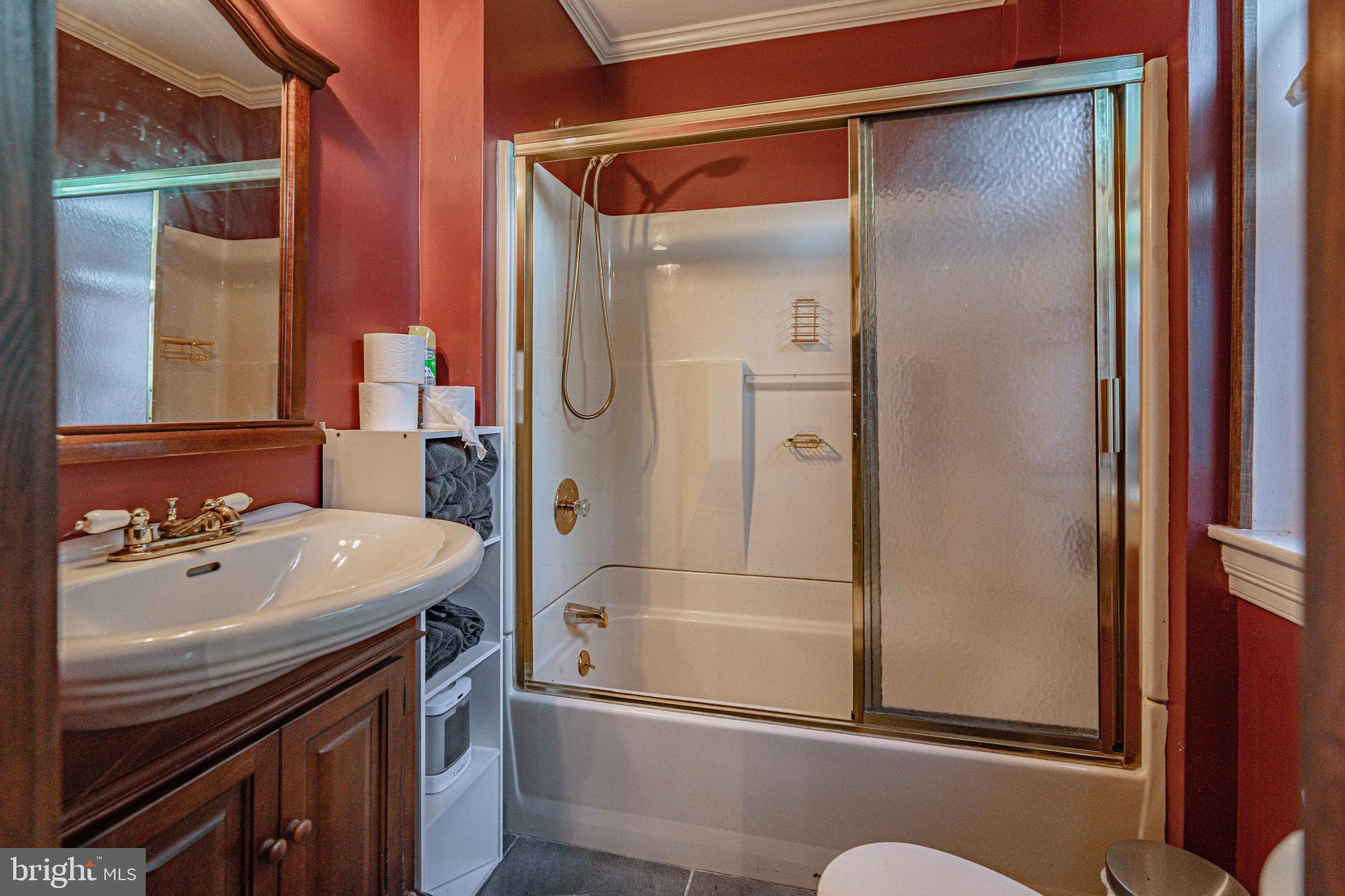 6230 Main Street Center Valley, PA 18034 - Photo 13 of 33 a bathroom with a sink mirror vanity and toilet