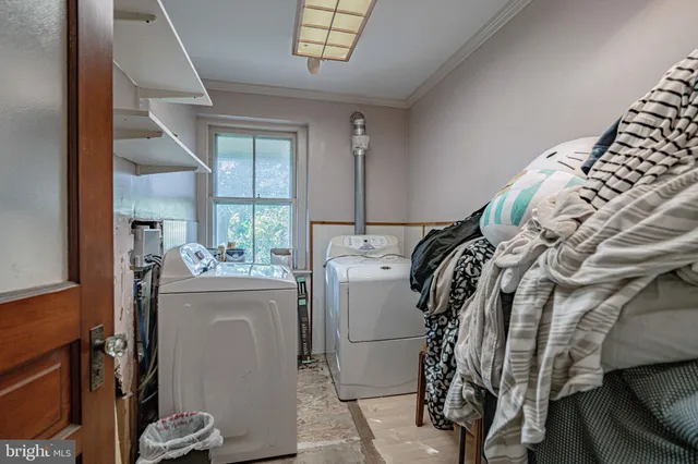 a bedroom with furniture and wooden floor