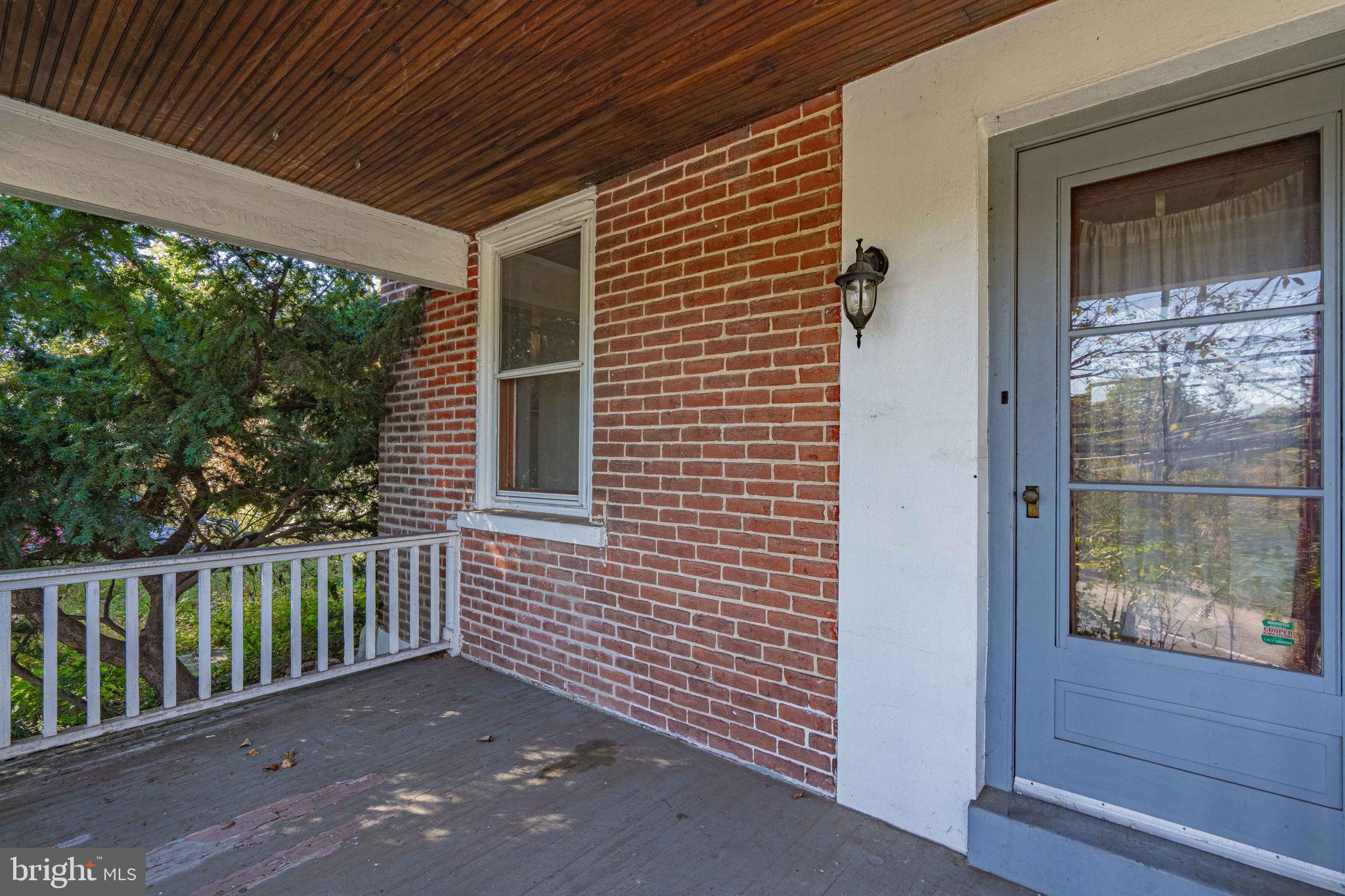 6230 Main Street Center Valley, PA 18034 - Photo 4 of 33 a view of a porch with a table and chairs