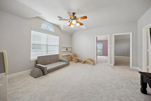 a view of a livingroom with a flat screen tv