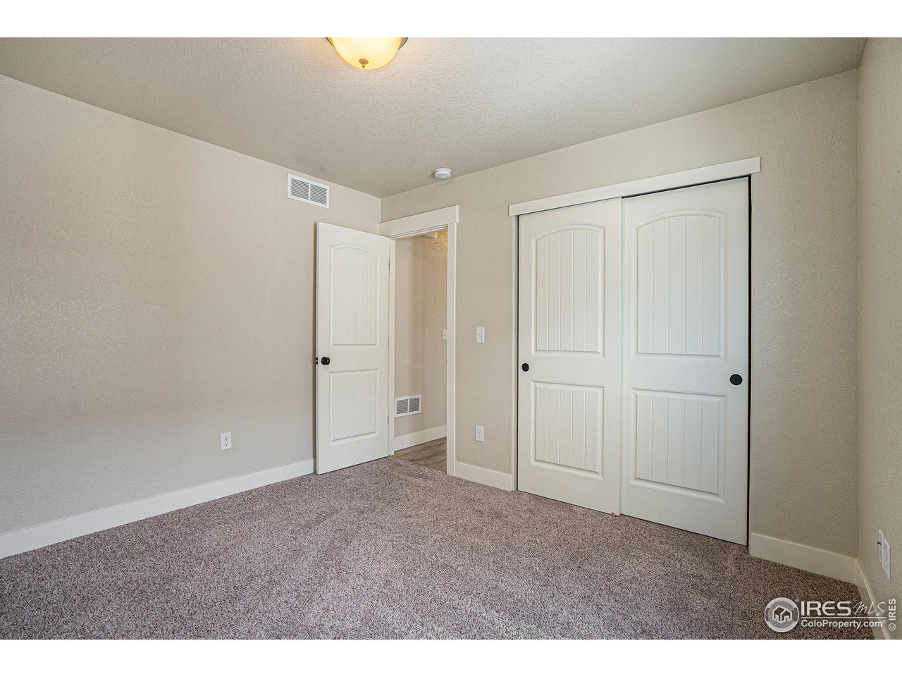 619 Davis Drive Frederick, CO 80530 - Photo 18 of 24 a view of an empty room