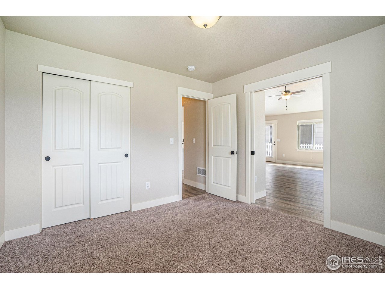 619 Davis Drive Frederick, CO 80530 - Photo 20 of 24 a view of a hallway