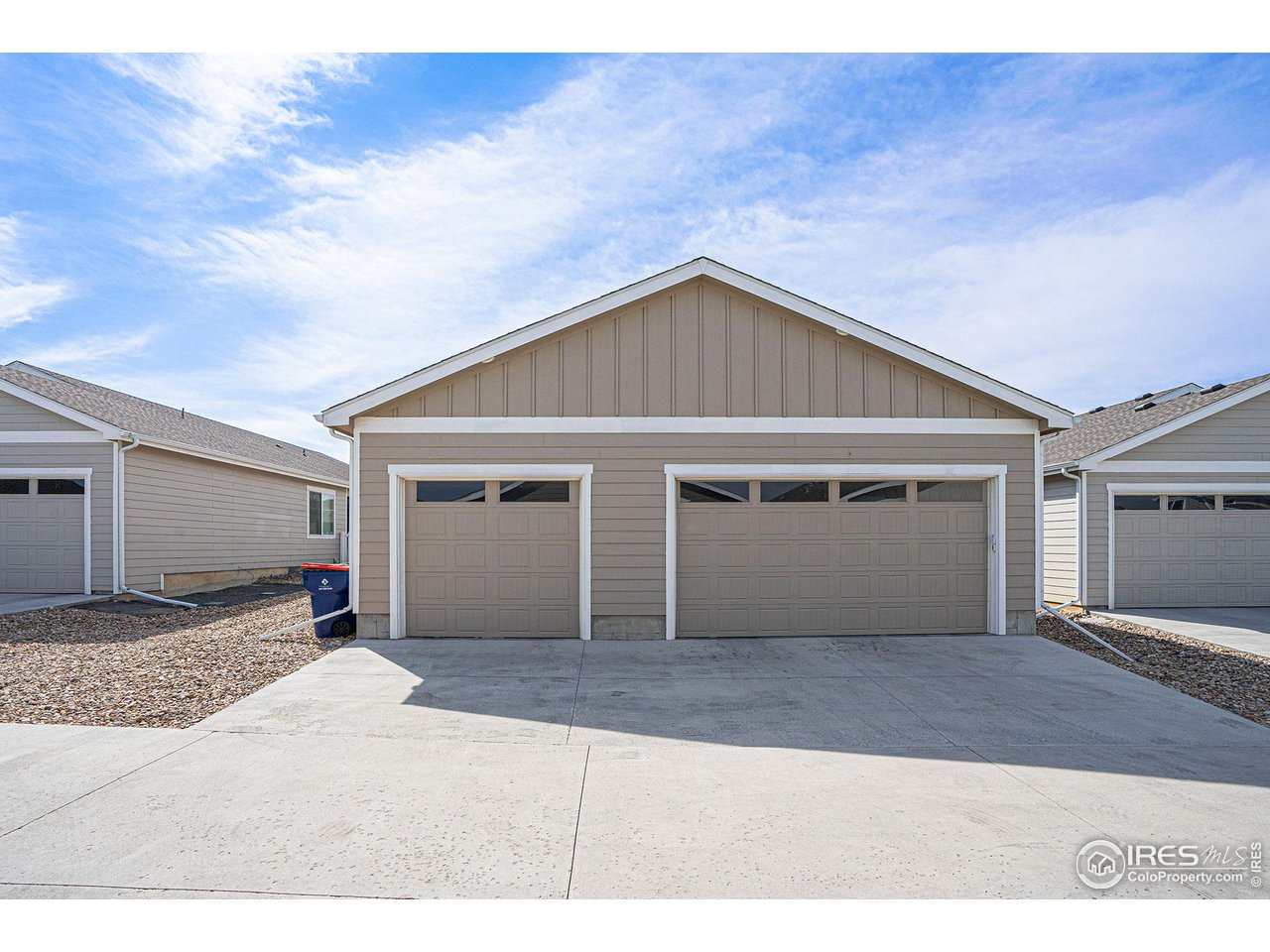 619 Davis Drive Frederick, CO 80530 - Photo 23 of 24 a front view of a house with a garage