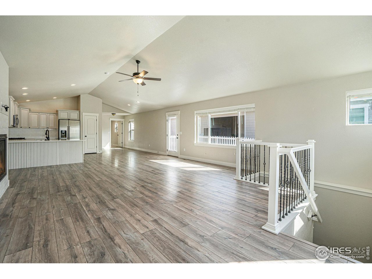 619 Davis Drive Frederick, CO 80530 - Photo 7 of 24 a view interior of a house wooden floor and a kitchen