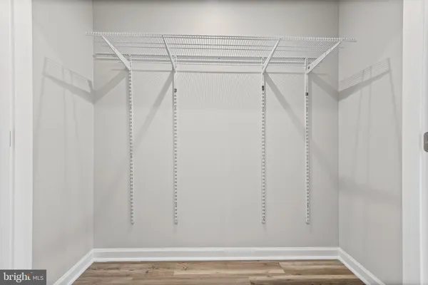 a view of a room with racks on the wall