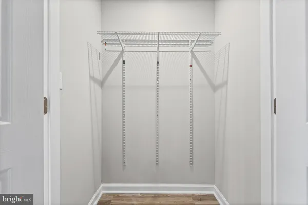 a view of a room with racks on the wall