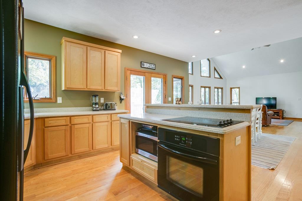 2144 Ridgeview Run Lynchburg, TN 37352 - Photo 11 of 29 a kitchen with a stove and a sink