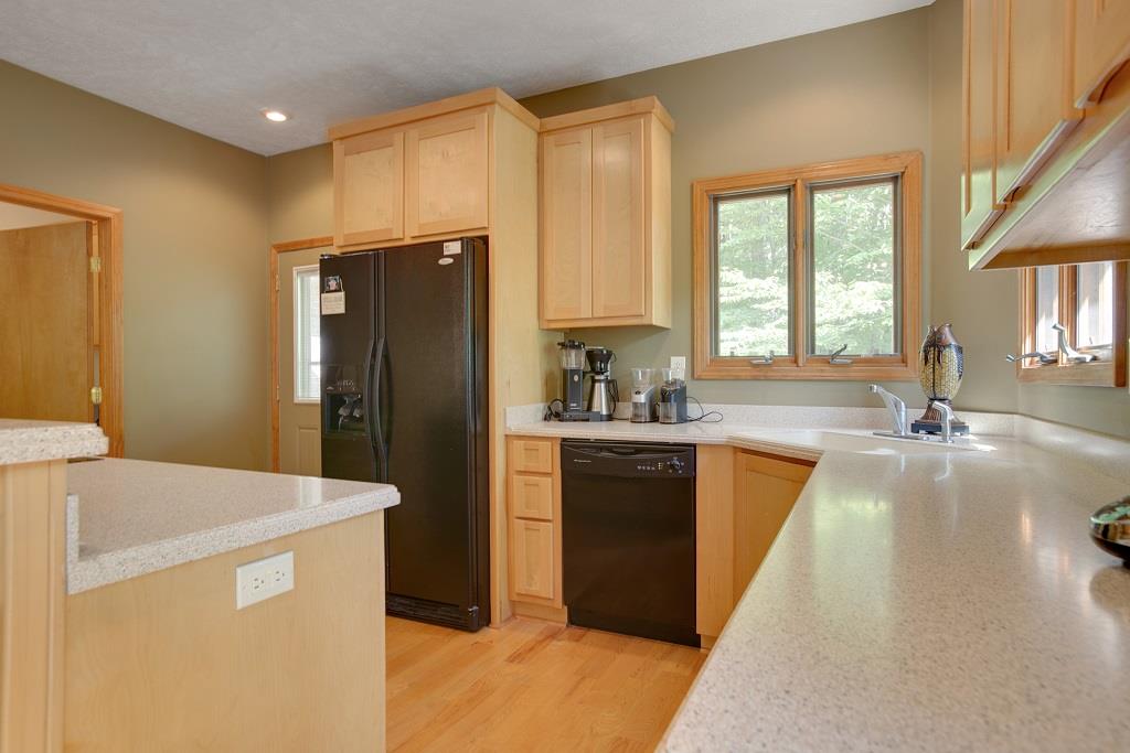 2144 Ridgeview Run Lynchburg, TN 37352 - Photo 12 of 29 a kitchen with a refrigerator a stove a sink and a window