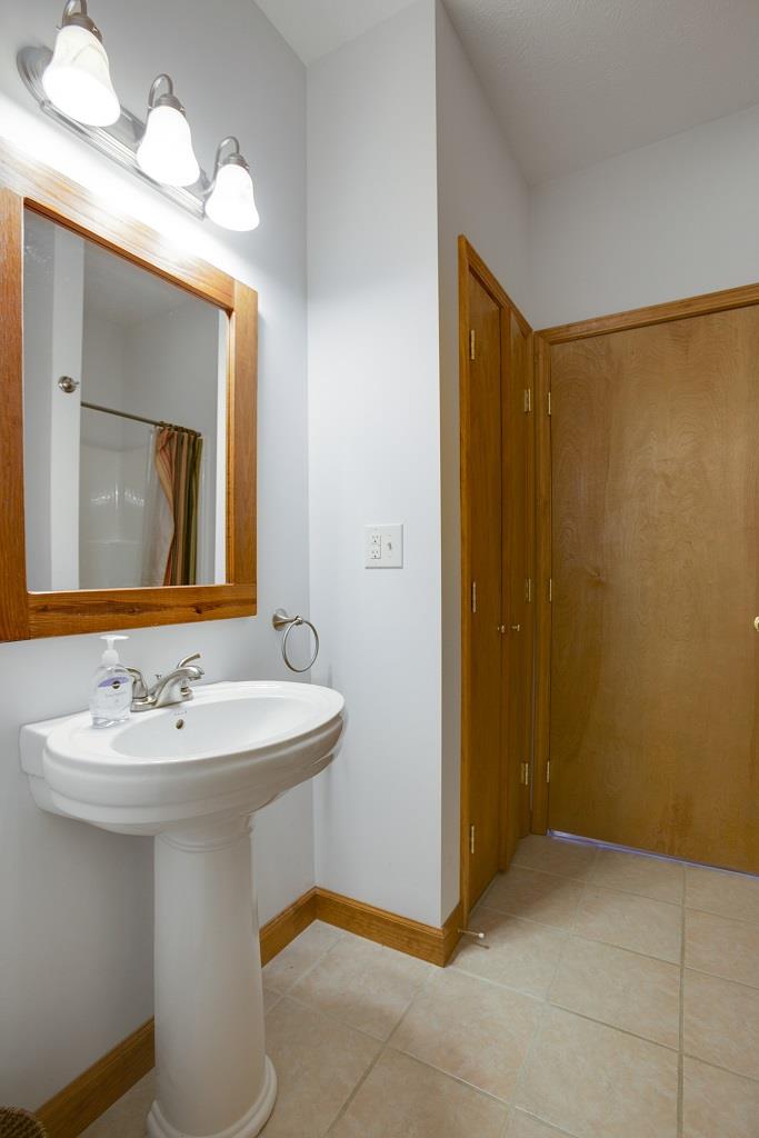 2144 Ridgeview Run Lynchburg, TN 37352 - Photo 20 of 29 a bathroom with a sink and a mirror