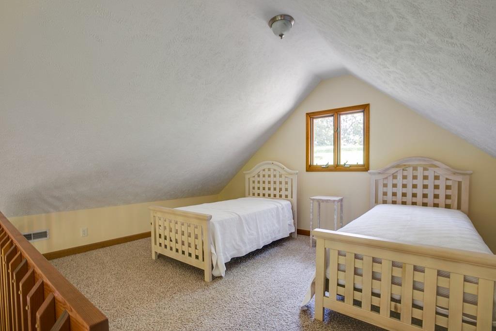 2144 Ridgeview Run Lynchburg, TN 37352 - Photo 21 of 29 a bedroom with a bed and a window