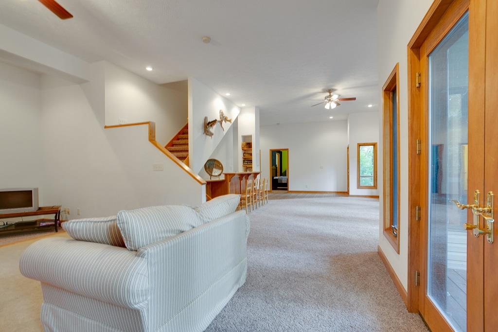 2144 Ridgeview Run Lynchburg, TN 37352 - Photo 23 of 29 a living room with furniture and a ceiling fan