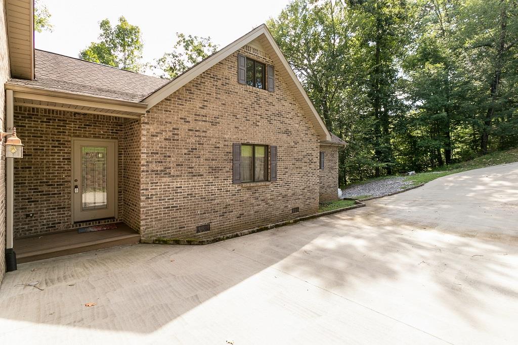 2144 Ridgeview Run Lynchburg, TN 37352 - Photo 5 of 29 a view of a house with a backyard