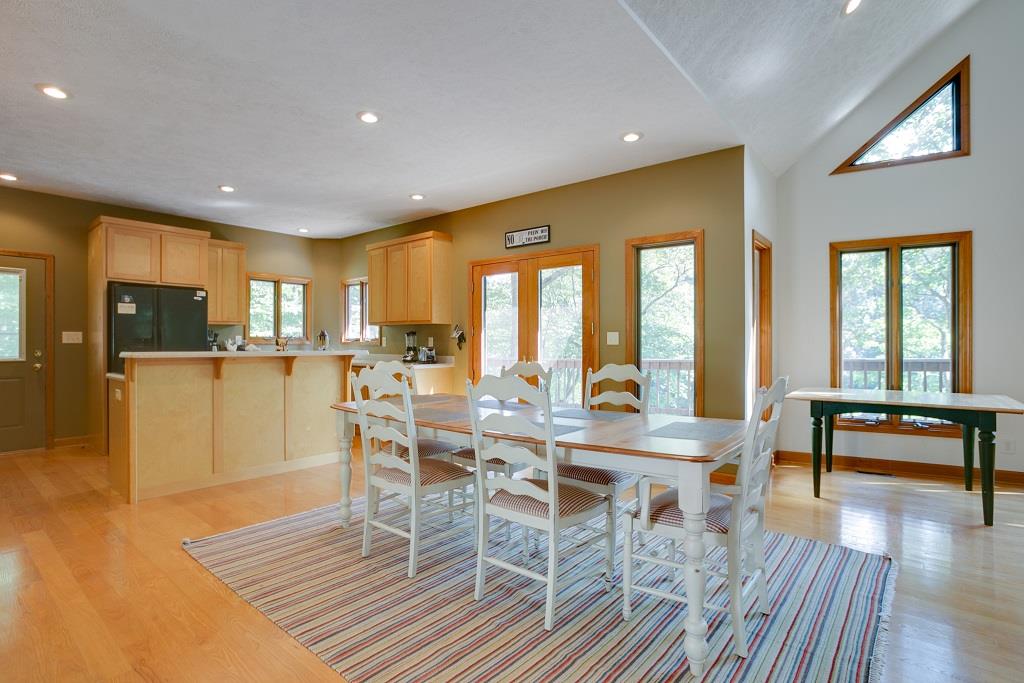 2144 Ridgeview Run Lynchburg, TN 37352 - Photo 10 of 29 a view of a dining room with furniture window and wooden floor