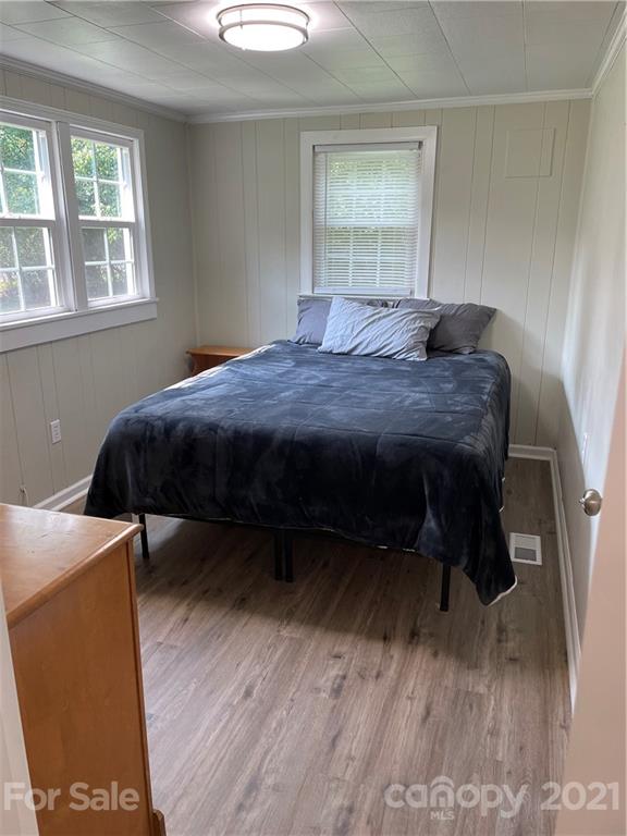 1027 Capps Road Bessemer City, NC 28016 - Photo 11 of 20 a bedroom with a bed and a window