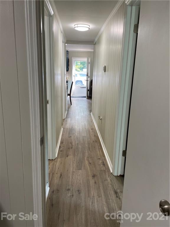1027 Capps Road Bessemer City, NC 28016 - Photo 15 of 20 a view of a hallway with wooden floor