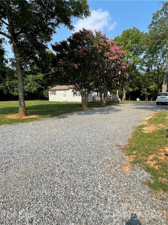 1027 Capps Road Bessemer City, NC 28016 - Photo 20 of 20 a view of backyard with green space