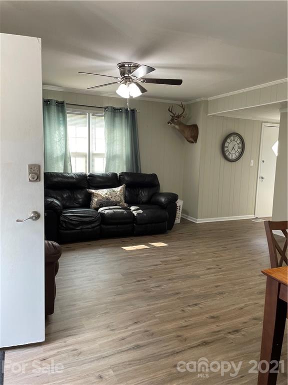 1027 Capps Road Bessemer City, NC 28016 - Photo 7 of 20 a living room with furniture and a window