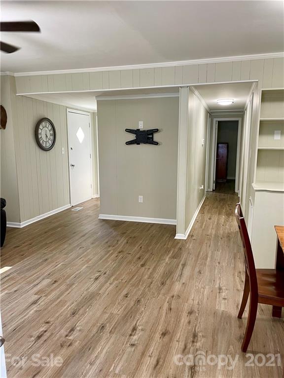1027 Capps Road Bessemer City, NC 28016 - Photo 9 of 20 a view of a hallway with wooden floor
