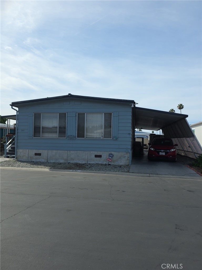 a car parked in front of a house