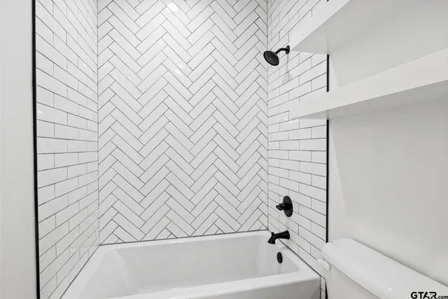 a bathroom with a bathtub