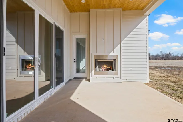 a view of a livingroom with a fireplace
