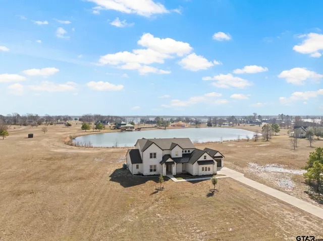 a view of a lake with outdoor space