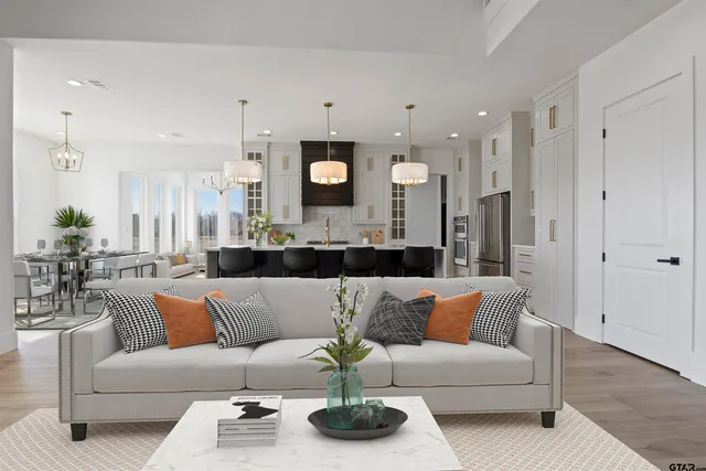a view of living room kitchen with furniture and kitchen view