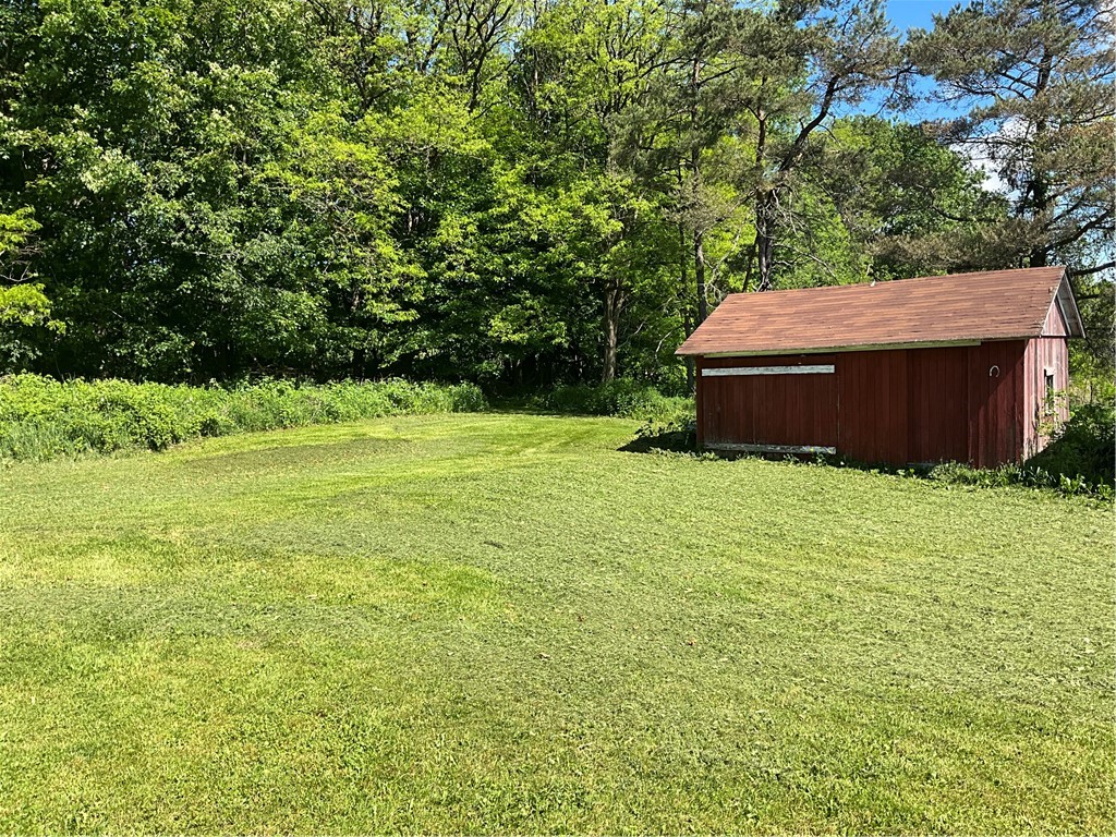 6801 Frazier Road Sempronius, NY 13118 - Photo 32 of 33 Back yard and shed