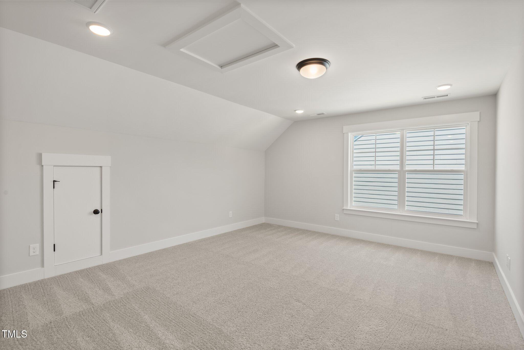 1306 Cricket Street Elon, NC 27244 - Photo 33 of 36 an empty room with a window