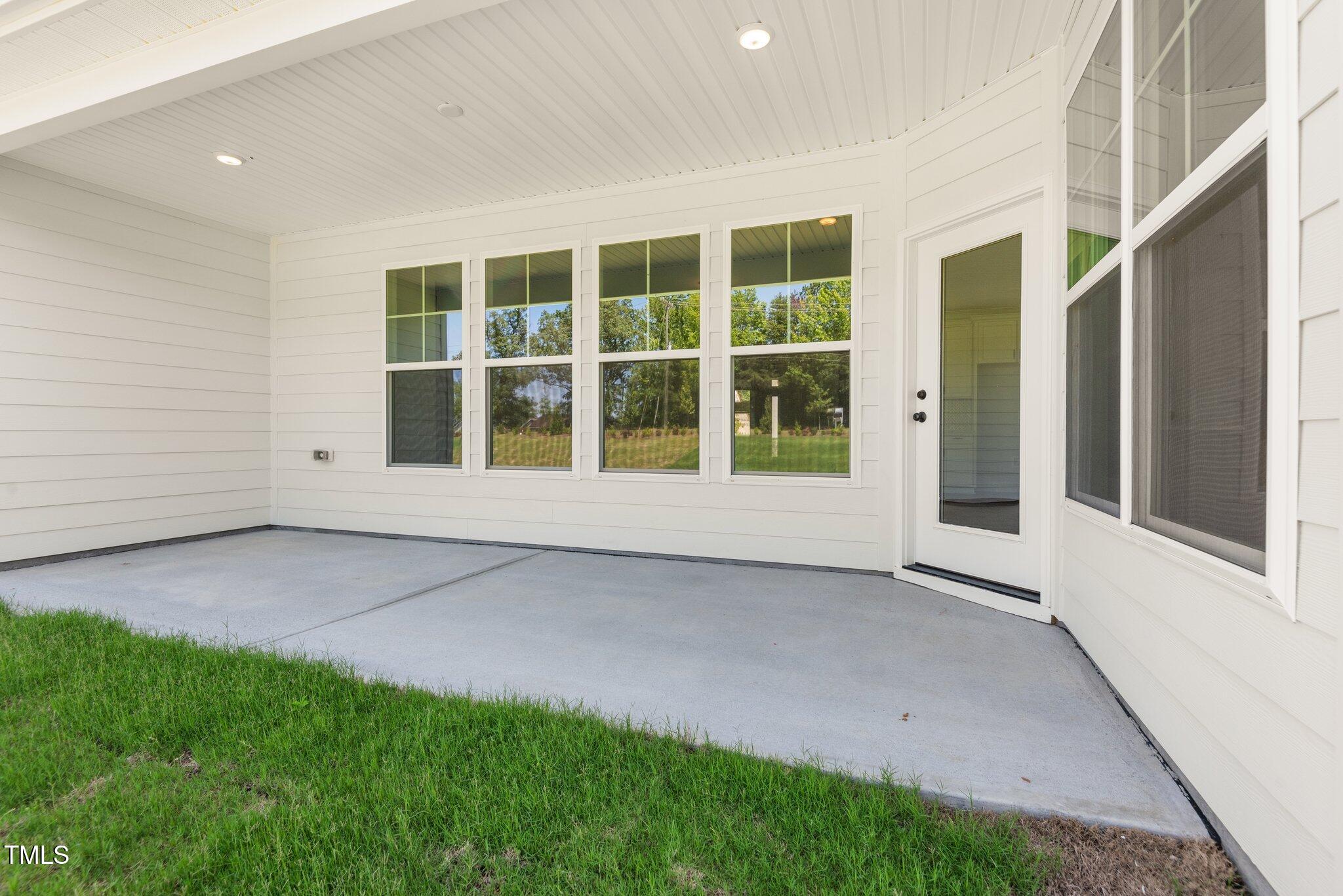 1306 Cricket Street Elon, NC 27244 - Photo 4 of 36 a view of an empty room with a window