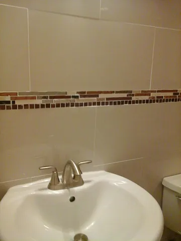 a bathroom with a sink and a toilet