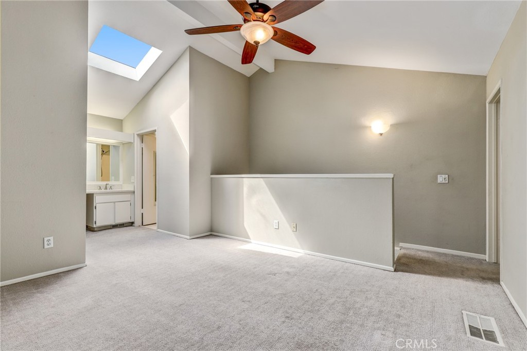 162 Pineview Irvine, CA 92620 - Photo 18 of 35 a view of an empty room with a ceiling fan