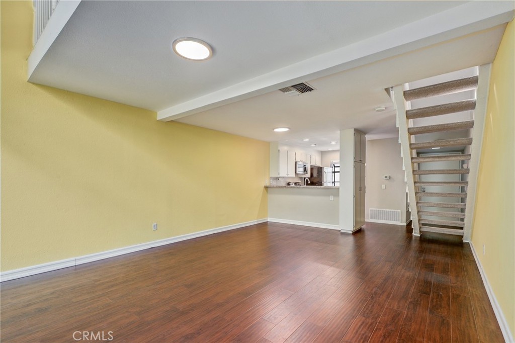 162 Pineview Irvine, CA 92620 - Photo 2 of 35 a view of a kitchen with a wooden floor