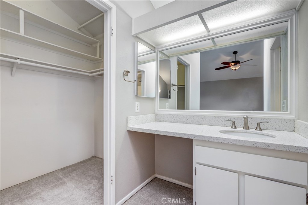 162 Pineview Irvine, CA 92620 - Photo 21 of 35 a bathroom with a sink and a mirror