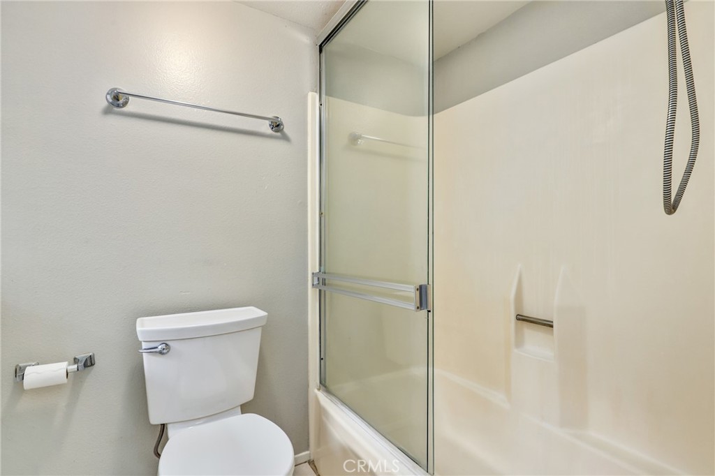 162 Pineview Irvine, CA 92620 - Photo 23 of 35 a white toilet sitting next to a shower