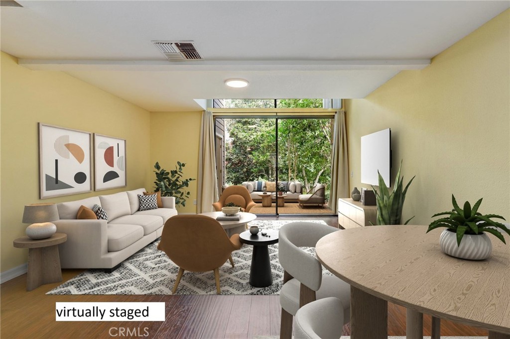 162 Pineview Irvine, CA 92620 - Photo 3 of 35 a living room with furniture and a large window