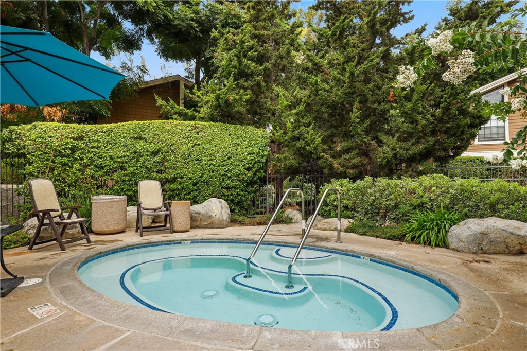 162 Pineview Irvine, CA 92620 - Photo 31 of 35 a view of a swimming pool with a patio