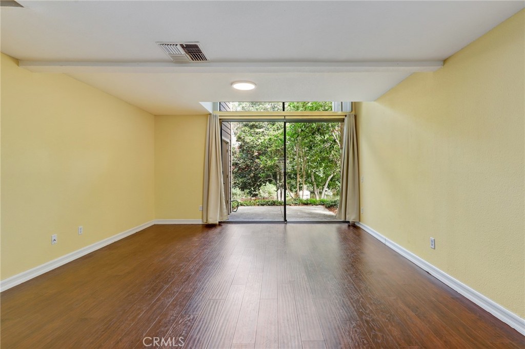 162 Pineview Irvine, CA 92620 - Photo 4 of 35 a view of a room with wooden floor and natural light