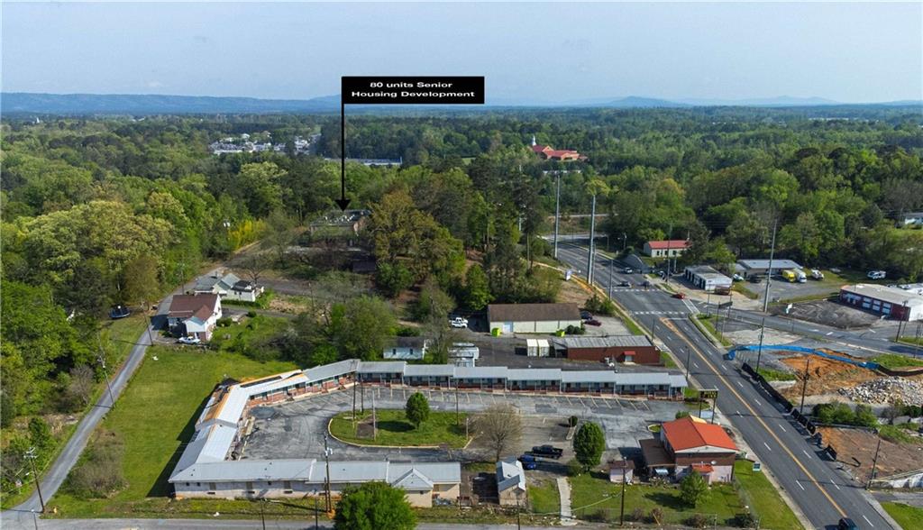 1201 Martha Berry Boulevard Northeast Rome, GA 30165 - Photo 6 of 10 a view of houses with swimming pool