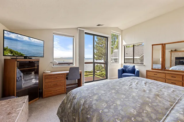 a bed room with a bed and furniture