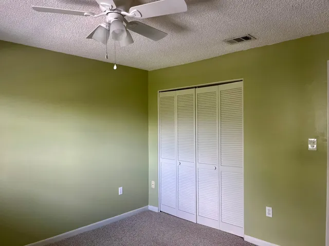 a bathroom with a sink a mirror and a toilet