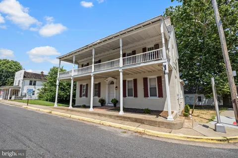 a view of a building with a garden
