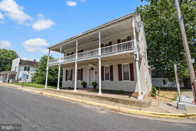 a view of a building with a garden