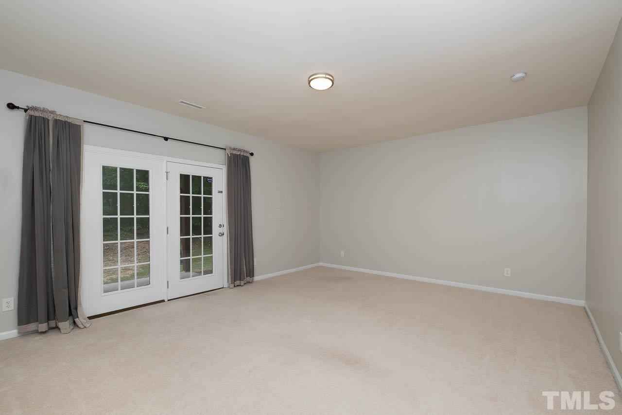 1658 Snow Mass Way Durham, NC 27713 - Photo 6 of 26 an empty room with windows