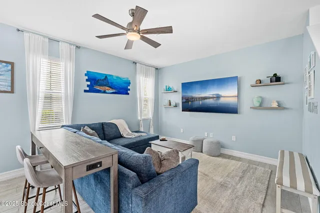 a living room with furniture and a couch