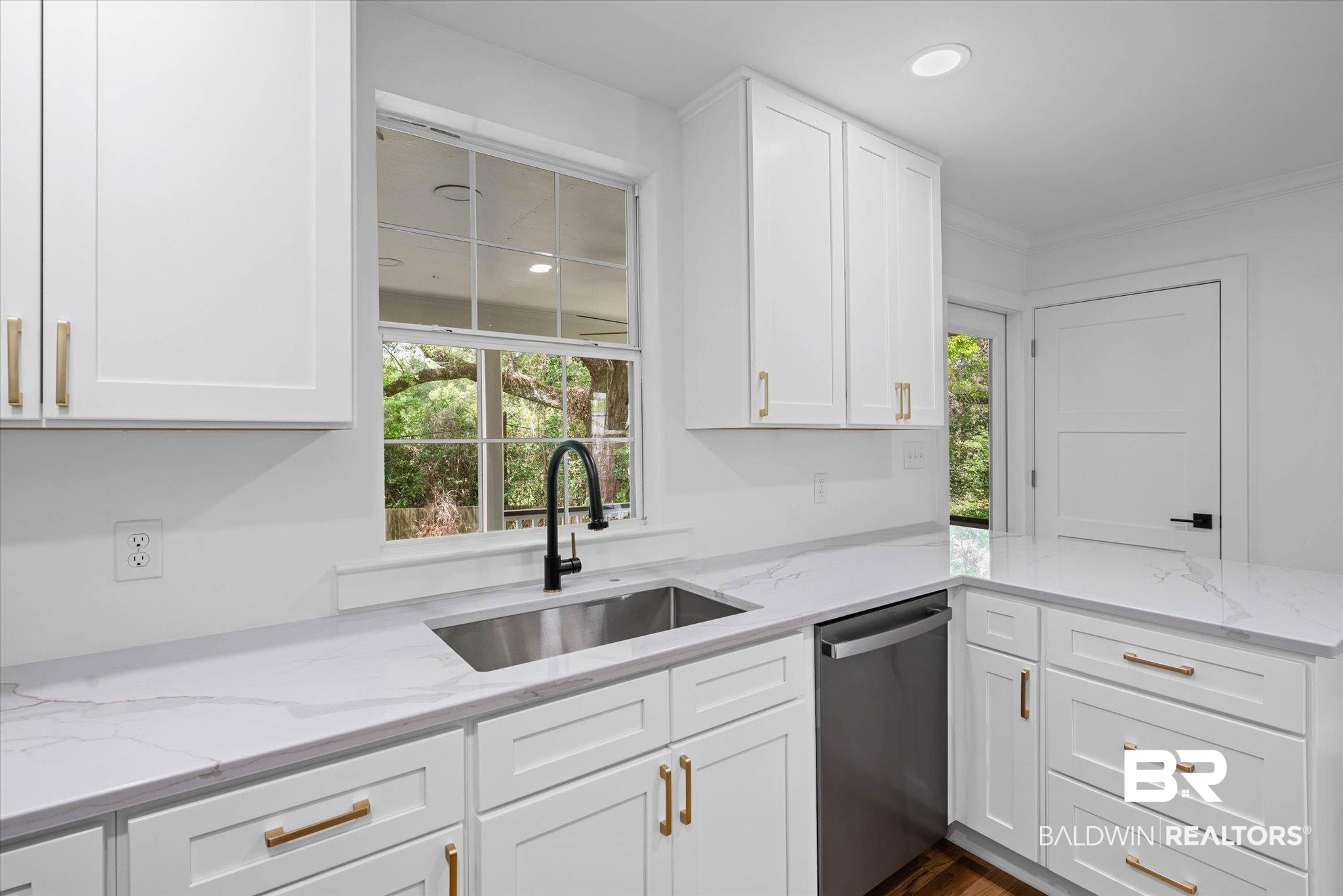 41 Hathaway Road West Mobile, AL 36608 - Photo 8 of 24 Kitchen featuring white cabinets, light stone countertops, dishwasher, recessed lighting, and a peninsula