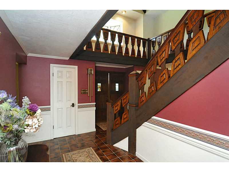 131 Thompson Hill Road Aliquippa, PA 15001 - Photo 2 of 25 Entry/Foyer. The grand entry offers a spectacular custom designed oak staircase with inlaid walnut and walnut handrail. The entry floor is ceramic tile.