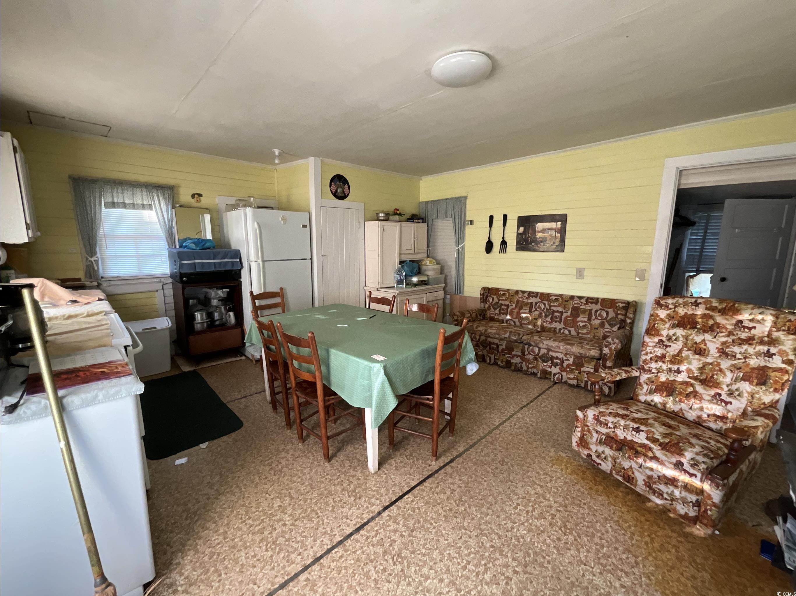 381 Retired Avenue Marion, SC 29571 - Photo 5 of 9 Dining space with wood walls