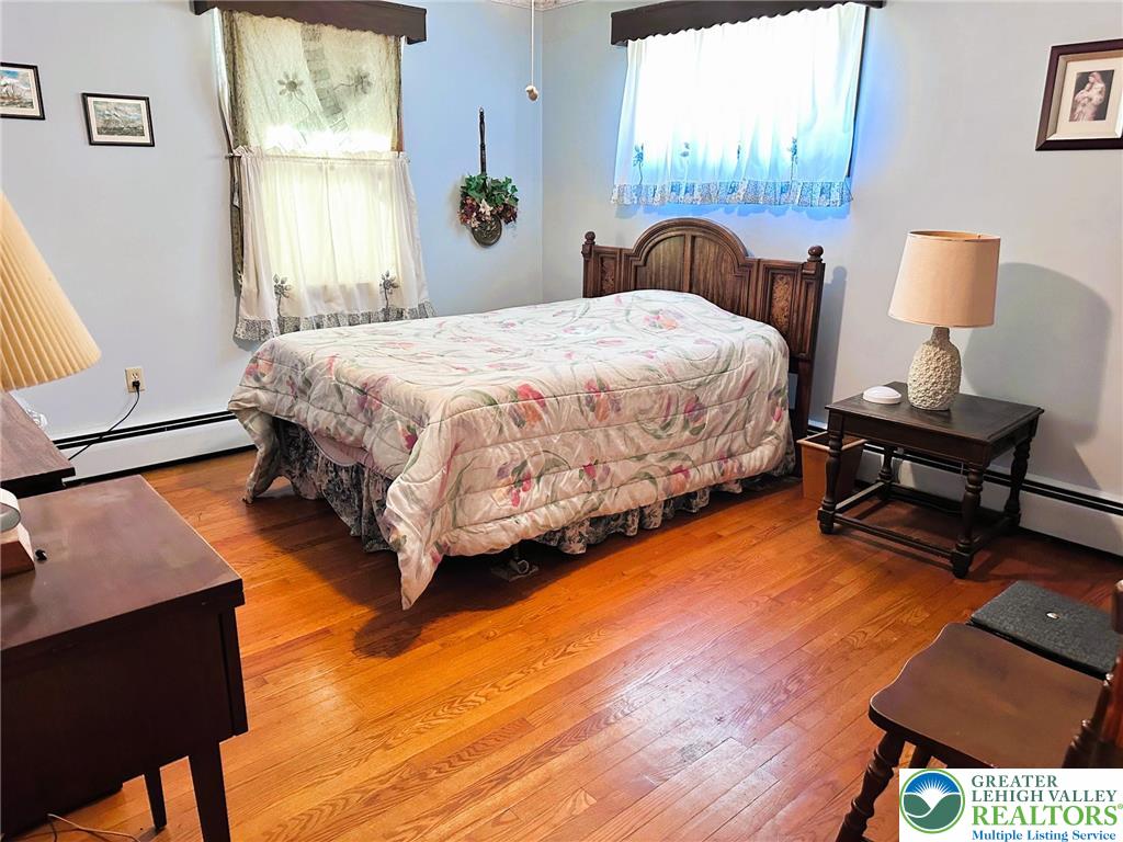 127 South 7th Street Coplay, PA 18037 - Photo 11 of 21 a bedroom with a bed dresser and a window